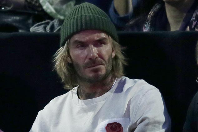Queen Elizabeth II honors former Man U youth coach who helped launch David Beckham's career