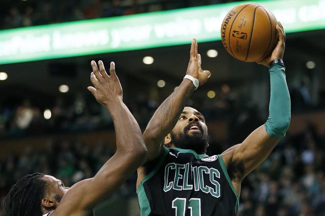 Celtics edge sloppy Nets to close year with three straight victories