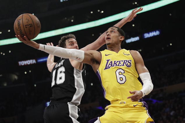 Lakers blow 19-point lead but recover with late blitz to hold off Spurs for third win in a row