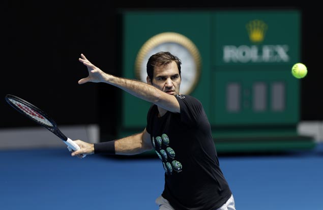 Federer downplays own chances, says Nadal and Djokovic are players to beat in Aussie Open