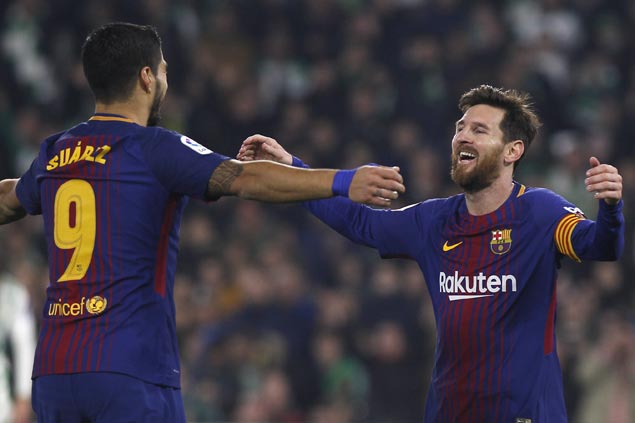 Lionel Messi, Luis Suarez lift Barcelona over Espanyol and into Copa semis