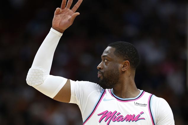 Heat defeat Bucks to halt five-game slide as Dwyane Wade returns to Miami