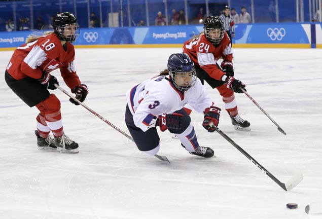 Switzerland wins Olympic opening matchup against combined Korean hockey team