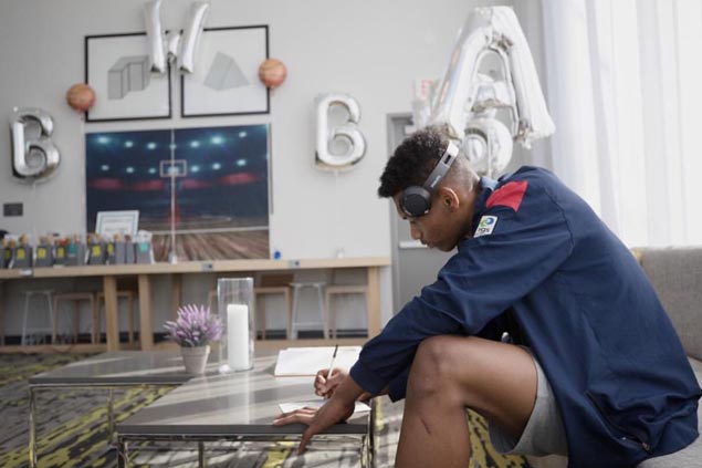 LOOK: Fil-Nigerian AJ Edu checks in for NBA-Fiba Basketball Without Borders camp