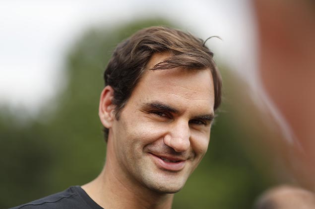 Federer moves a win away from breaking Agassi mark as oldest male to top tennis rankings