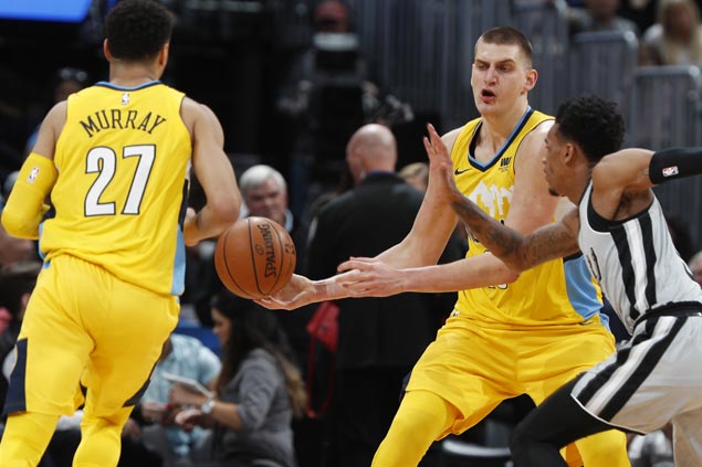 Nikola Jokic posts triple-double before fouling out and Nuggets hold on to beat Spurs