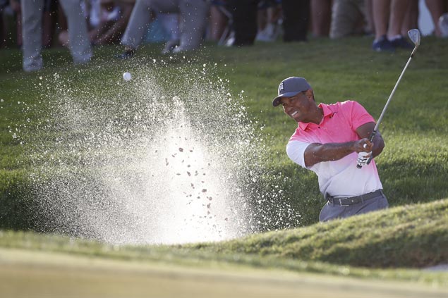 Another solid round keeps Tiger Woods within striking distance at PGA National