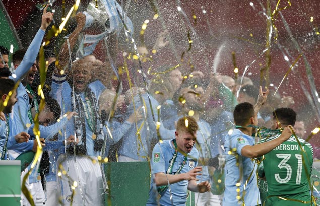 Guardiola finally claims first trophy with City as old guard star in Carabao Cup final win over Arsenal
