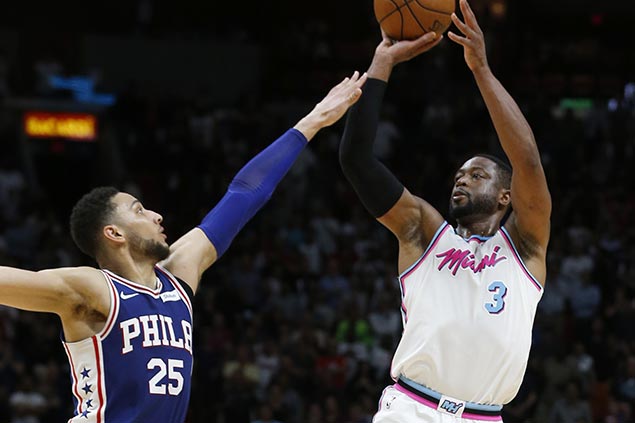 Wade honors Florida school tragedy victim buried wearing his Heat jersey with vintage show