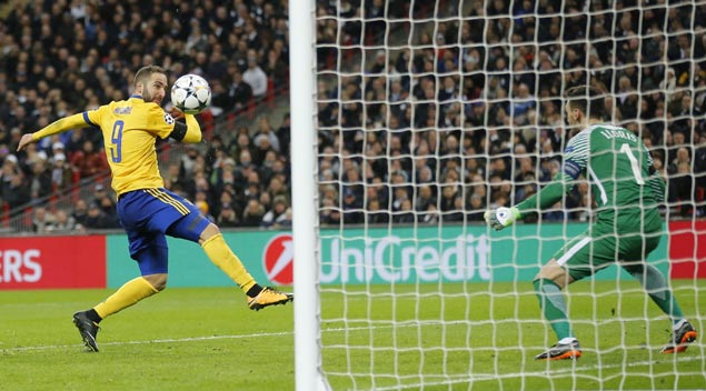 Two goals in three minutes power Juve past Spurs and into Champions League quarters