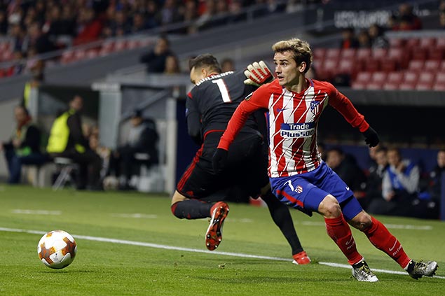 Griezmann carries Atletico Madrid over Celta Vigo to keep pace with La Liga leader Barcelona