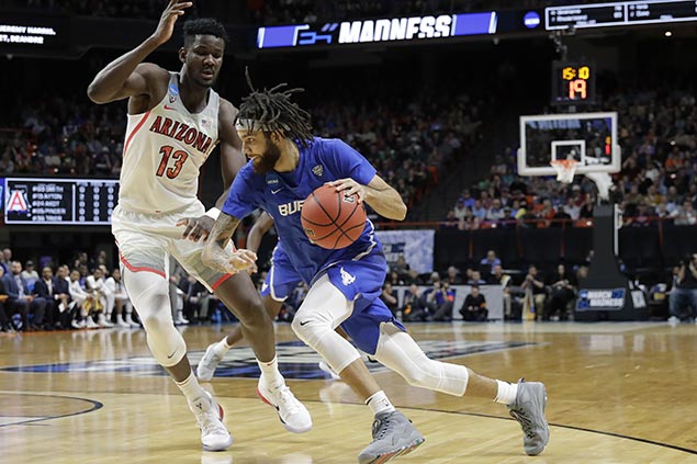 Buffalo pulls off biggest upset of NCAA tournament opening round with rout vs Arizona