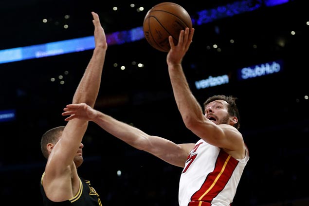 Goran Dragic powers Heat past Lakers to forge virtual tie for seventh in East