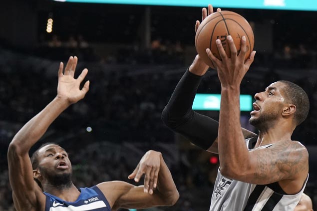 Spurs back in middle of West playoff race, beat Wolves for third straight win