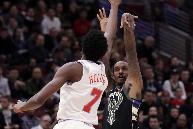 Bucks overcome poor start to beat Bulls, move within a half-game of seventh-place Miami in East