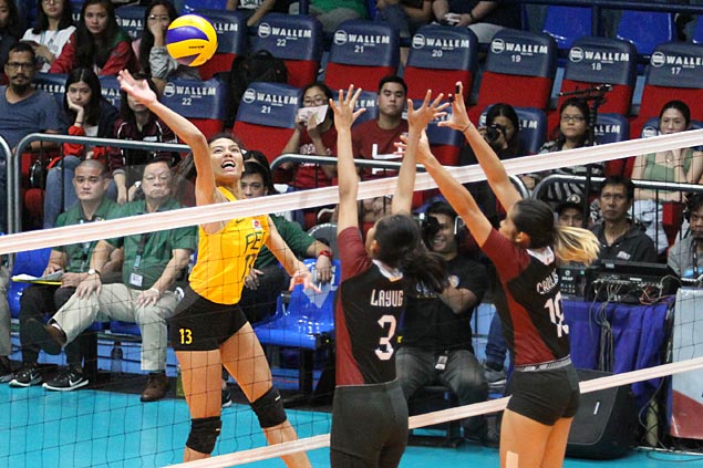 FEU fights back from a set down to turn back UP and close in on Final Four berth