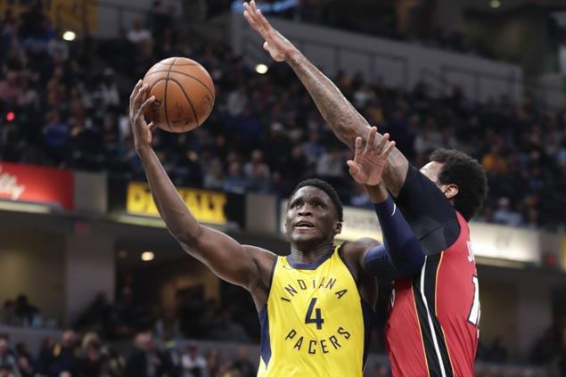 Pacers secure playoff berth with overtime win over Heat