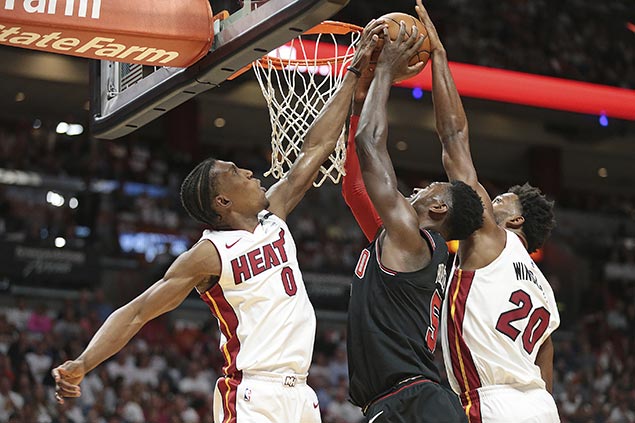 Heat move a win away from clinching playoff spot with romp over lowly Bulls