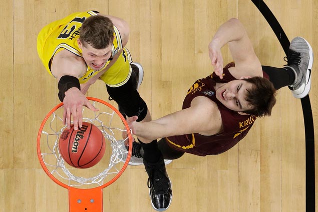 Moe Wagner and Michigan sustain charge to gain national final and halt Loyola’s Cinderella run