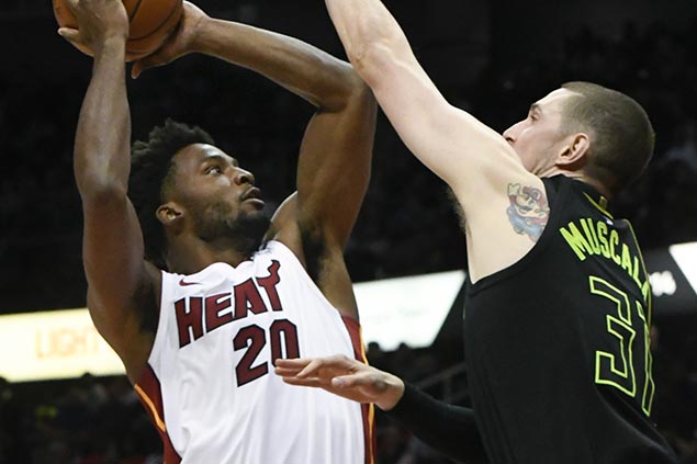 Hot-shooting Heat ride second quarter surge to assert mastery over Hawks