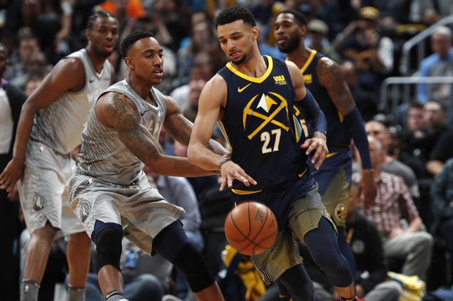 Balanced Nuggets overcome Timberwolves to boost playoff bid