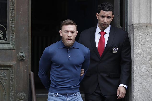 McGregor sorry to injured fighters in 'justified' attack as MMA star faces criminal charges