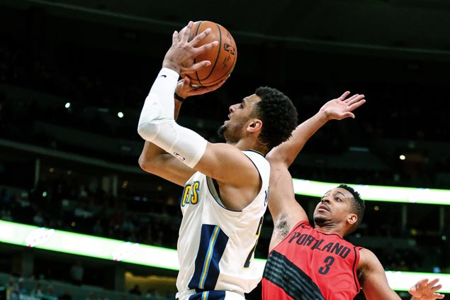 Nuggets keep playoff hopes alive with comeback win over Trail Blazers