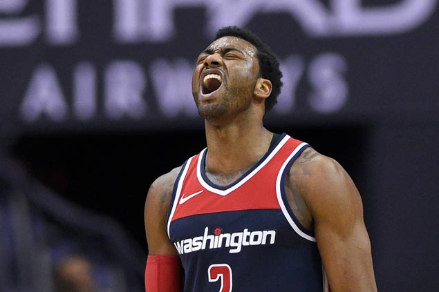 John Wall reaches 5,000 career assists as Wizards stay in play for No. 6 in East with win over Celtics