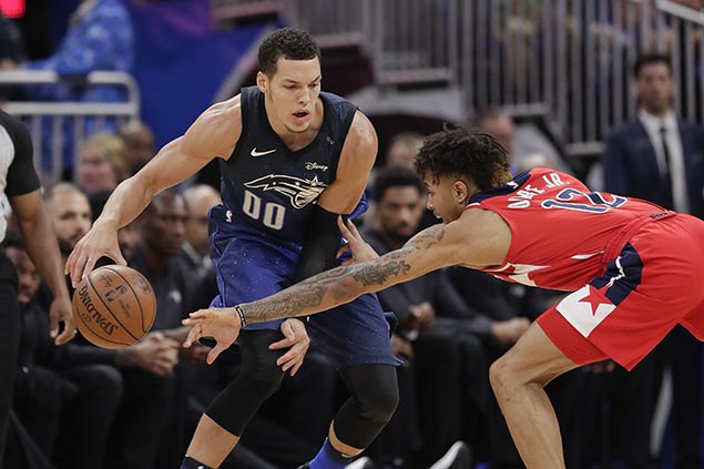 Magic pulls away late as cold-shooting Wizards fall to eighth in East