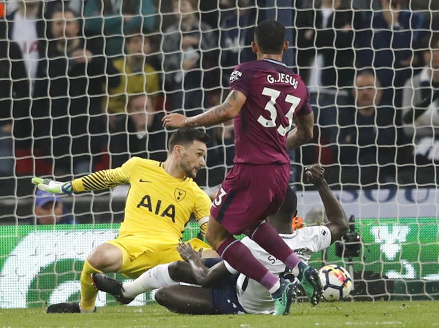 Man City bounces back to beat Spurs and close in on Premier League title