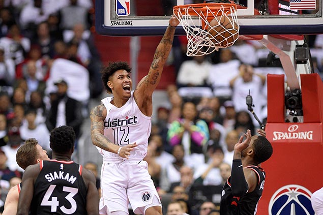Wizards bounce back strong to tame Raptors in heated Game Three