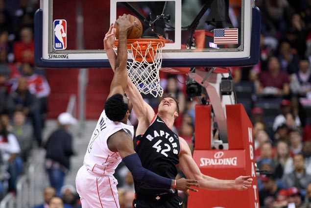 John Wall takes charge in endgame and Wizards beat Raptors to tie series