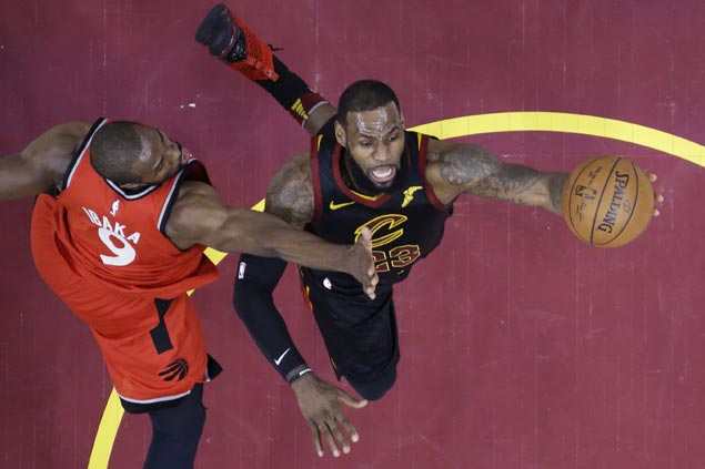 LeBron James hits last-gasp basket as Cavs nip Raptors to close in on East finals