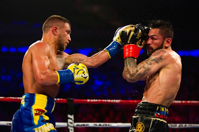 Lomachenko keeps his promise by surviving knockdown to stop tough Linares in 10th