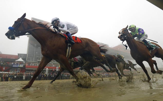 Justify on track for Triple Crown with big Preakness victory at foggy, muddy Pimlico