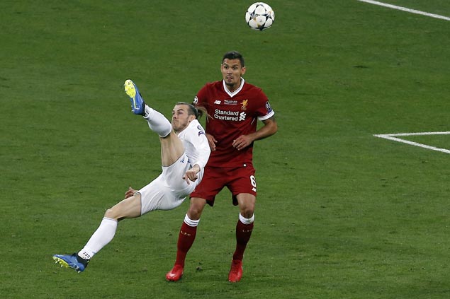Gareth Bale scissor-kick highlights Madrid rout of Liverpool for third straight Champions League title