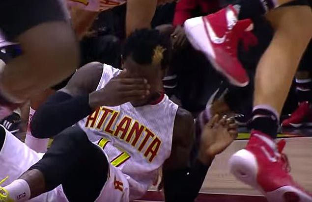 WATCH Dennis Schroder loses tooth in collision, puts it in his sock and plays on