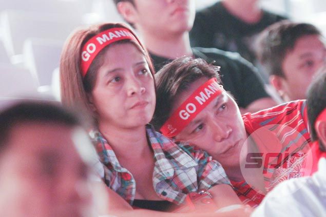 Fans cry foul as Pacquiao defeat a dampener for multitude gathered at Philippine Arena