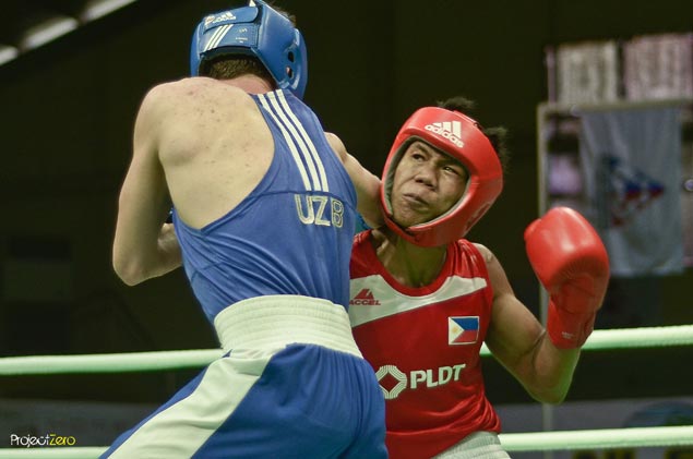 Olympic bid stalls for Eumir Marcial with loss by unanimous decision to Uzbek foe