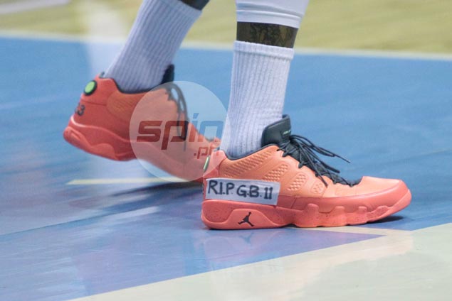 Reynel Hugnatan pays tribute to late friend Gilbert Bulawan after displaying number and initials on playing sneakers