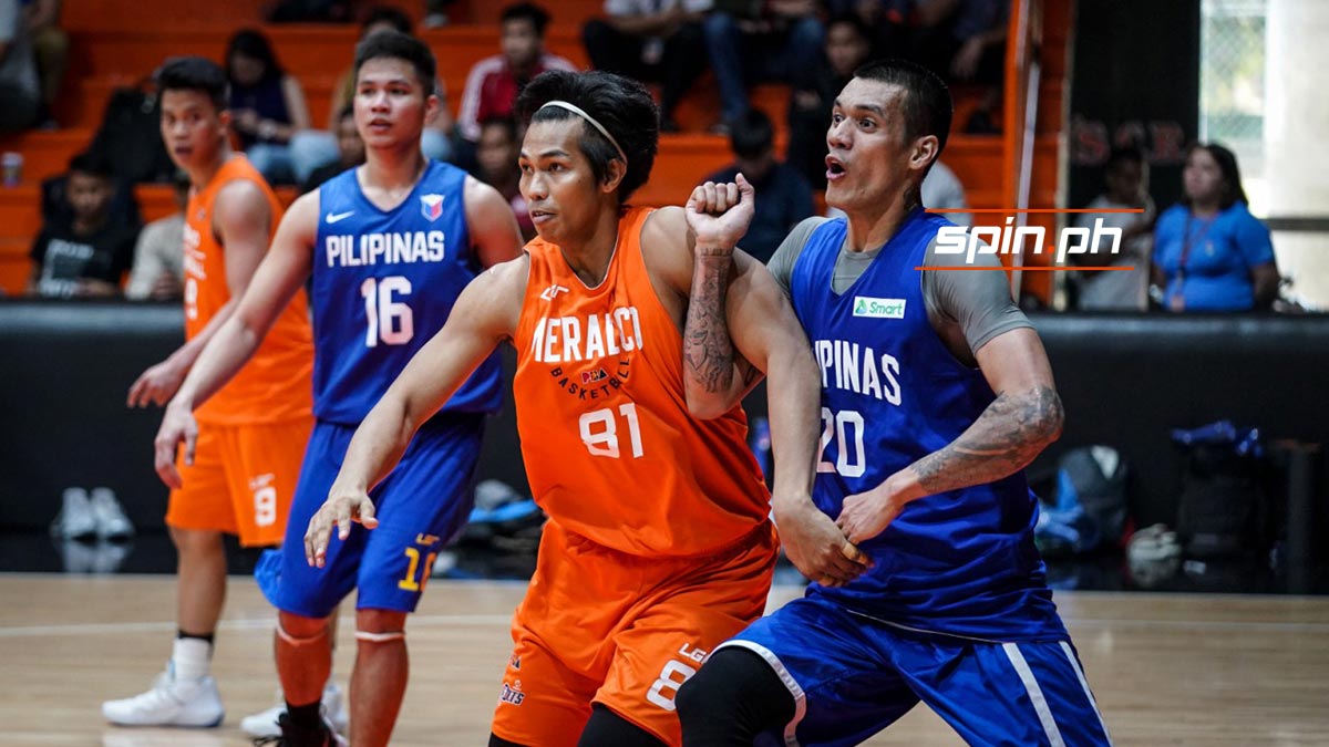 raymond almazan and jammer jamito battle for position.