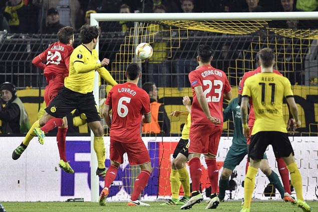 Liverpool holds Borussia Dortmund to a draw in first leg of Europa League quarters