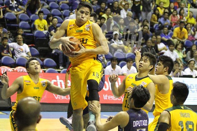Cruz proves the answer to FEU's prayers as Tamaraws outduel NU Bulldogs in overtime