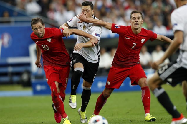 Germany grinds out a goalless draw versus Poland; Ukraine first team booted out of Euro 2016