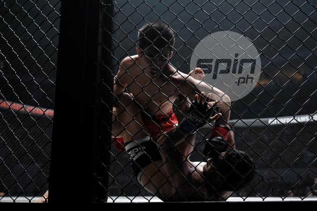 Yoshitaka Naito retains One Championship title and keeps record unblemished, stopping Joshua Pacio in third round