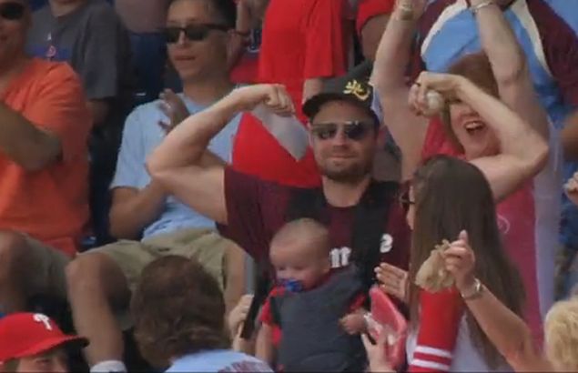 Oh, baby! Dad catches hard foul ball in Phillies game with infant son strapped to his chest