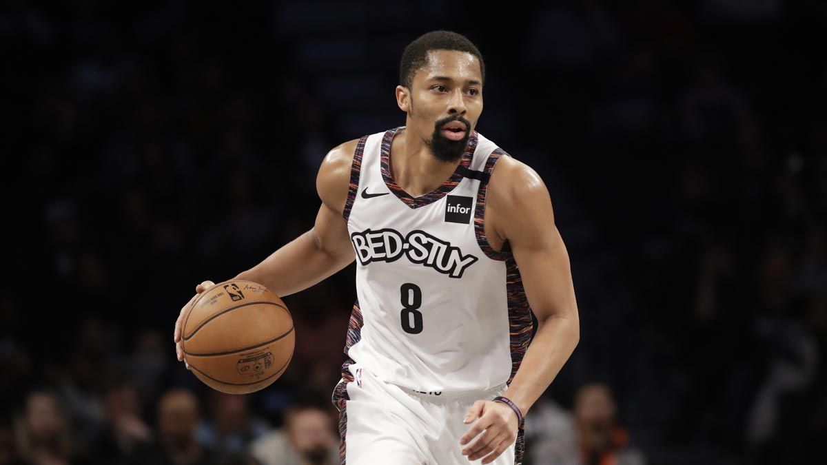 Spencer Dinwiddie playing for the Brooklyn Nets and wearing the iconic Bed-Stuy jersey of the team.