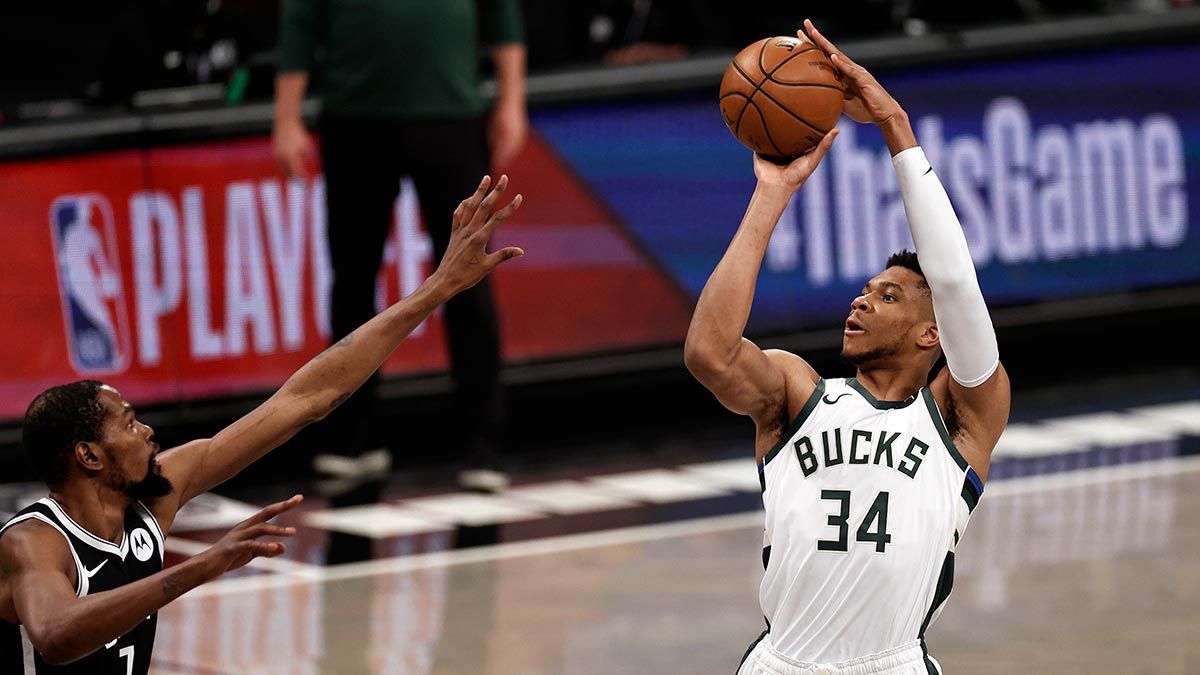 Giannis Antetokounmpo shoots over Kevin Durant in the East finals