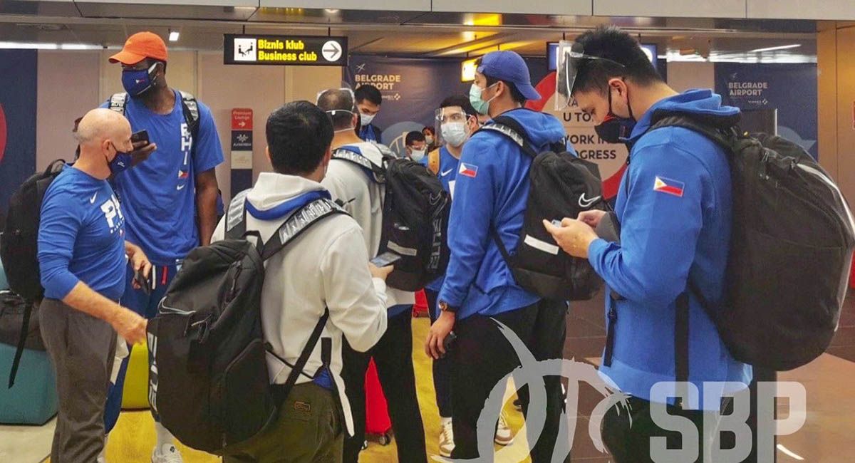 Gilas Pilipinas players and coaches arrive safely in Belgrade after a long flight.