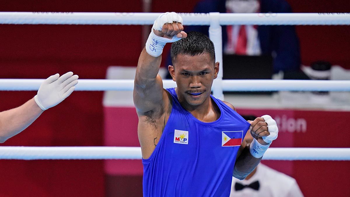 Eumir Marcial shows Philippine flag